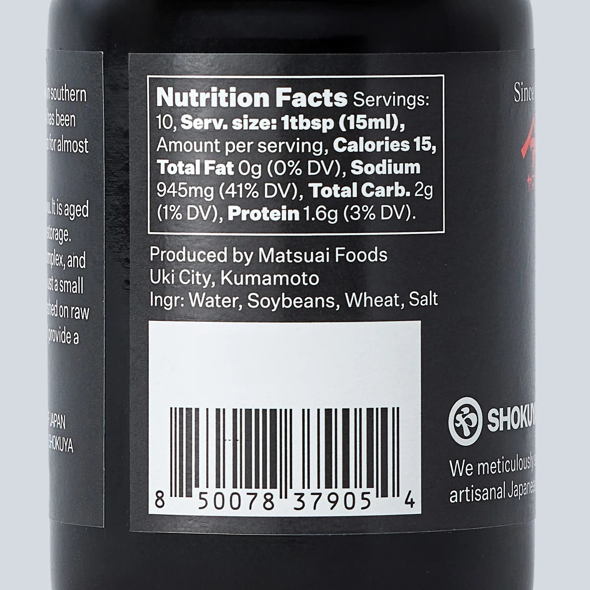 Nutrition facts label and barcode on a black bottle label