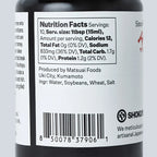 Marudaizu nutrition label up close on a black bottle and gray background