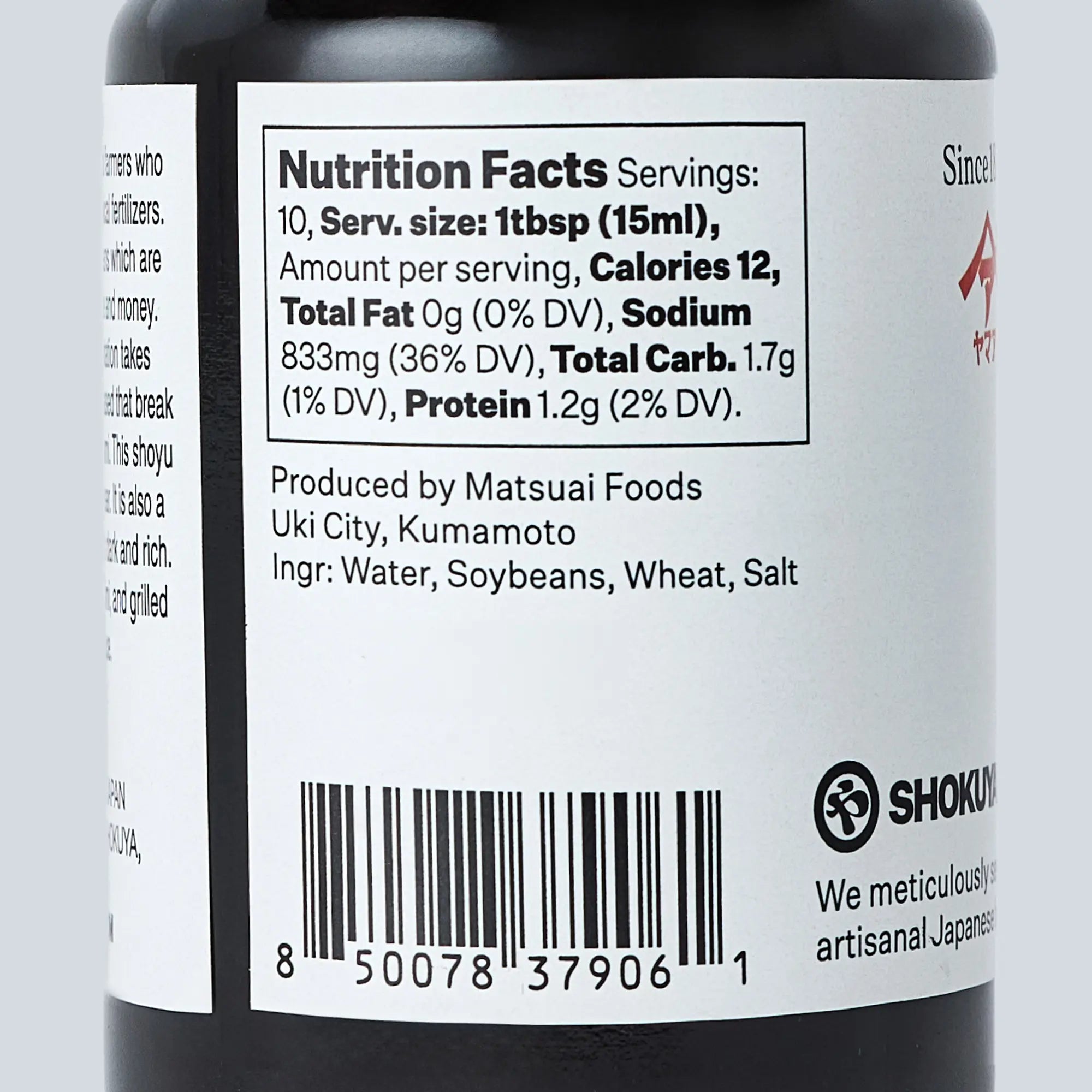 Marudaizu nutrition label up close on a black bottle and gray background