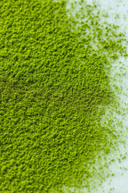 Close-up of Honyama matcha powder on a white surface