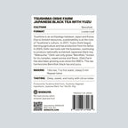 The back of a Shokuya TSUSHIMA OISHI FARM JAPANESE BLACK TEA WITH YUZU package, showing product details, cultivation, format, making, tasting notes, ingredients, a QR code, and a barcode on a white background.