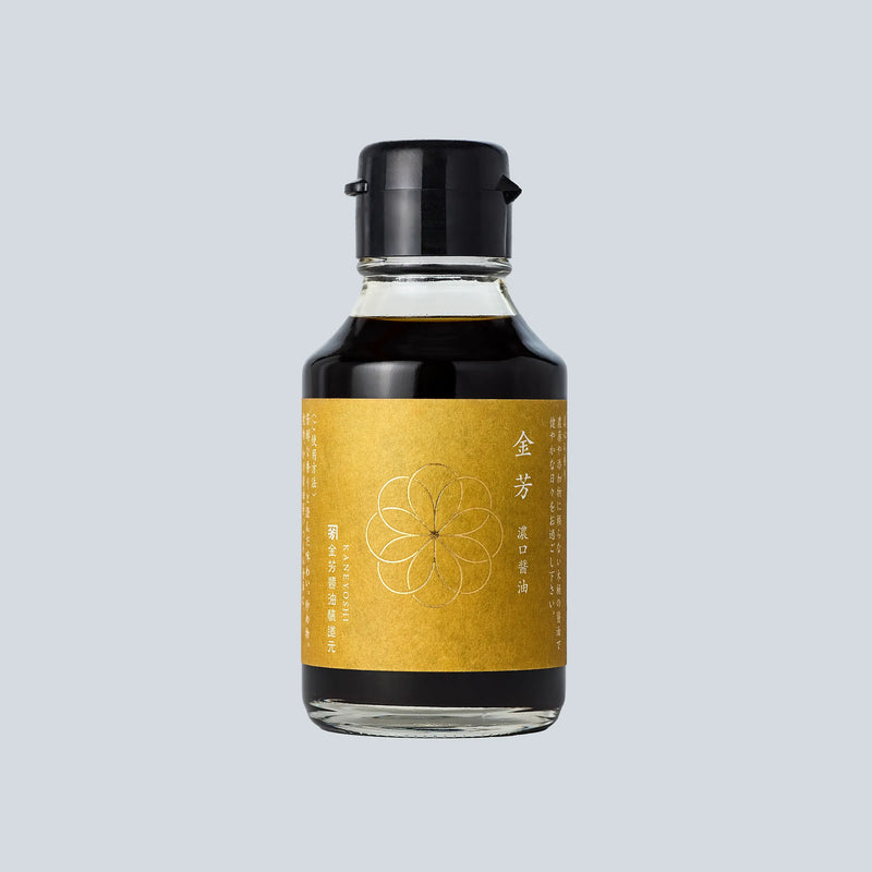 Bottle with a yellow label on a gray background