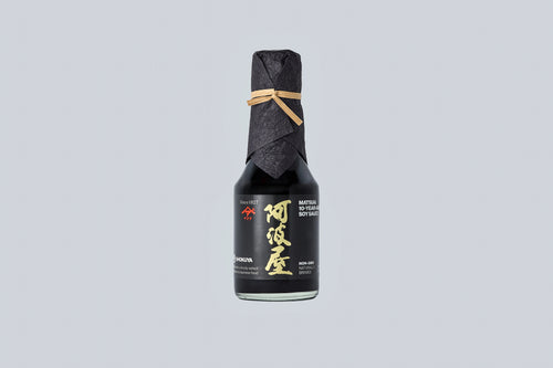 Bottle of Matsuai 10-Year-Aged Soy Sauce with a textured label on a light gray background. 