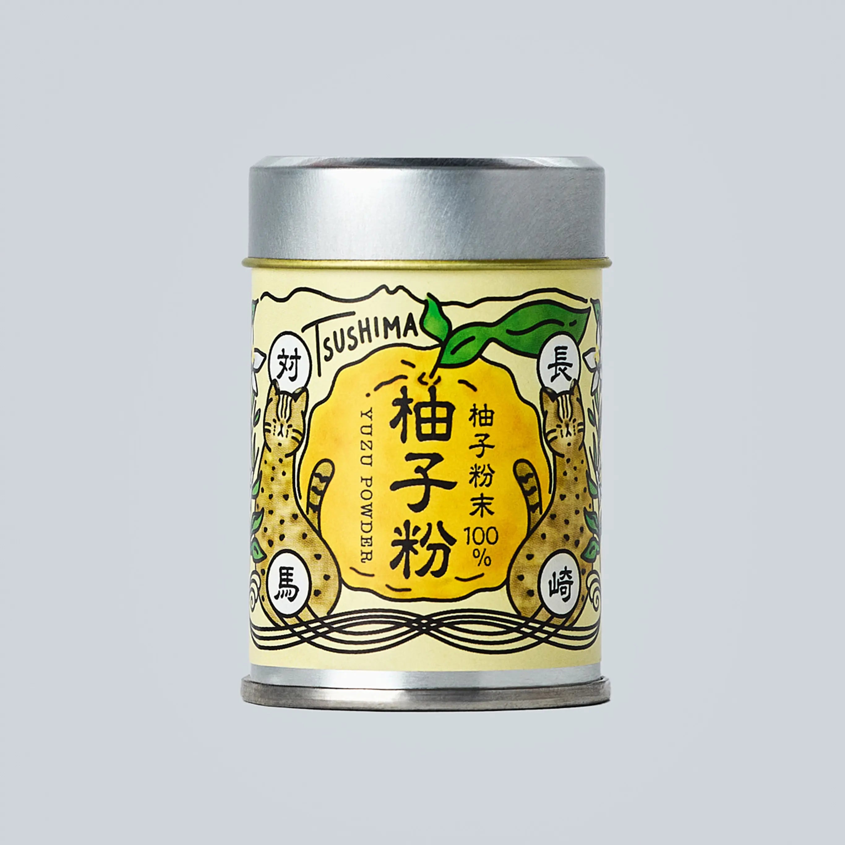 Small metal canister of Japanese yuzu powder from Oishi Farm centered on a light gray background, with a yellow illustrated label showing yuzu fruit and Japanese text.