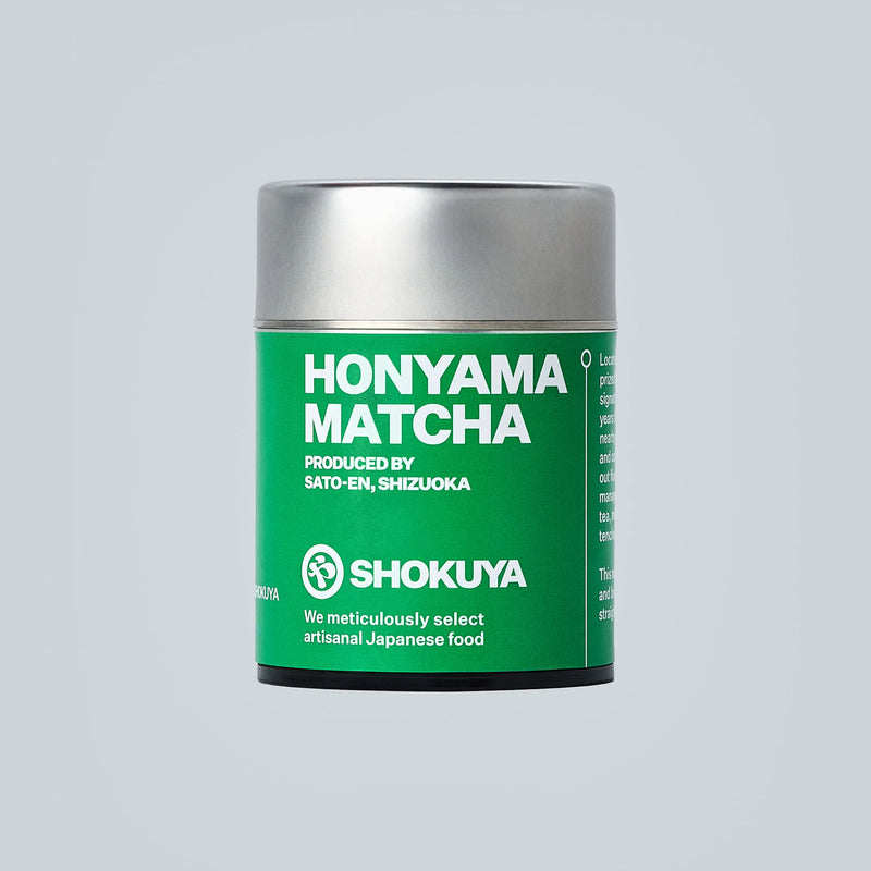 Honyama Matcha green tea canister on a light gray background